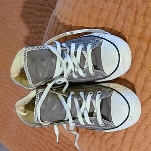 Men's high top Converse Chuck Taylor All-Stars.